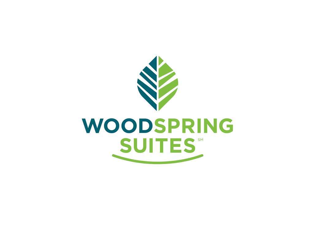 Woodspring Suites New Orleans Airport Kenner Logo photo